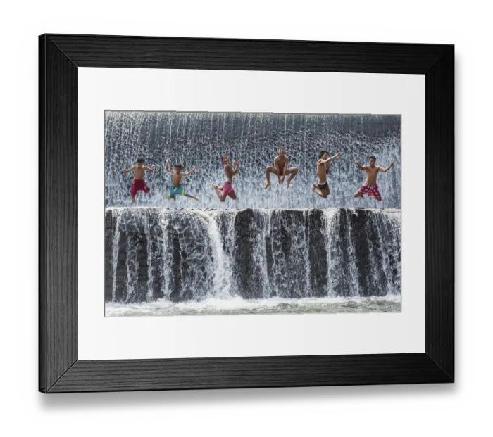 Framed Print : Boys jumping in a waterfall and having fun Framed Print : Boys jumping in a waterfall and having fun