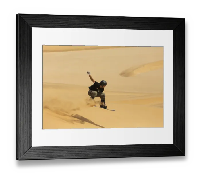 Framed Print : Sand boarding in the dunes of the Namib Desert