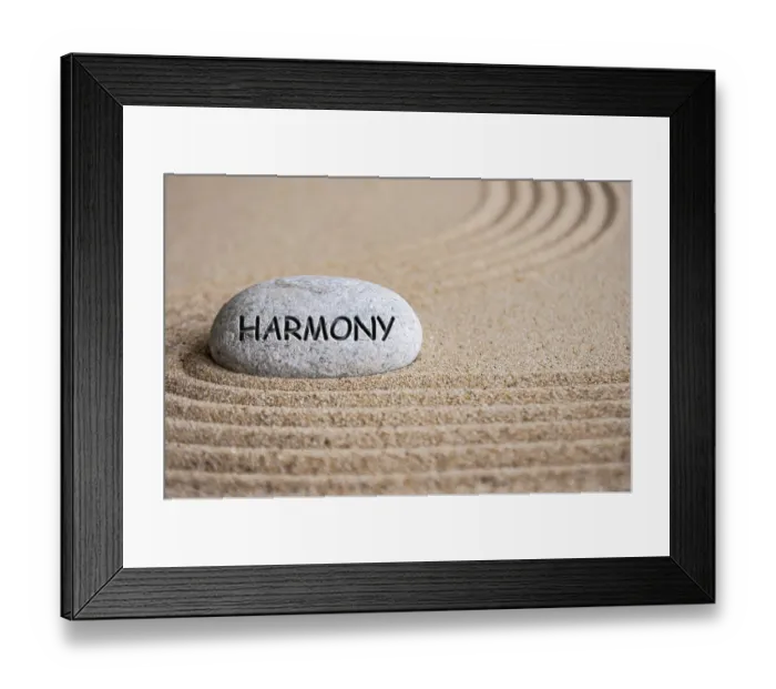 Framed Print : Harmony text engraved on Zen stone on sand Framed Print : Harmony text engraved on Zen stone on sand