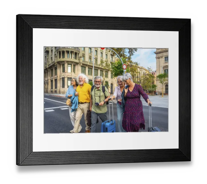 Framed Print : Smiling group of senior friends exploring a european city on vacation