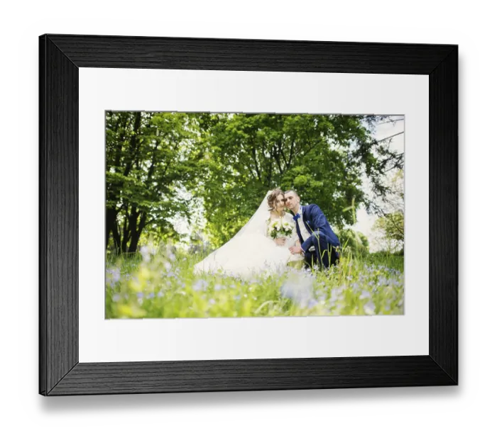 Framed Print : Young lovely and cheerfull wedding couple walking at the park Framed Print : Young lovely and cheerfull wedding couple walking at the park