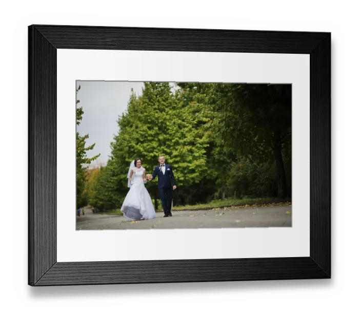 Framed Print : Wedding couple walking at green park