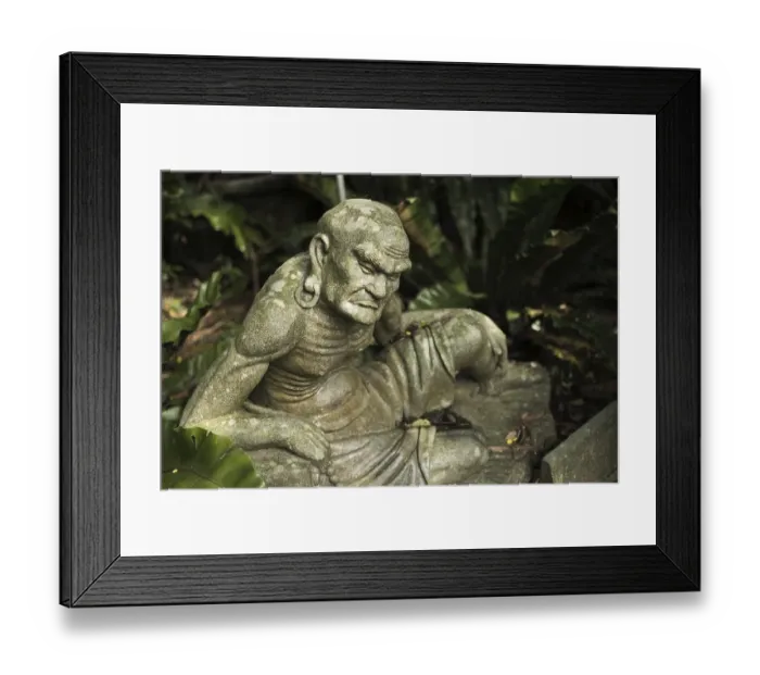 Framed Print : Old ruined Arhat Kanakbharadvaja statue in forest