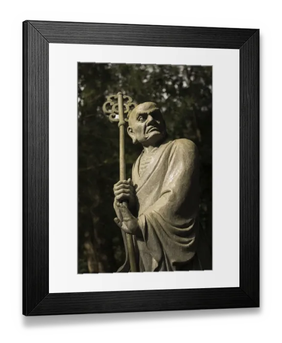 Framed Print : Old ruined Arhat Kanakbharadvaja statue in forest