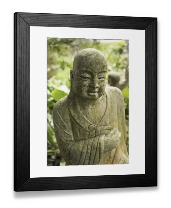 Framed Print : Ruined stone statue Ksitigarbha Bodhisattva in garden
