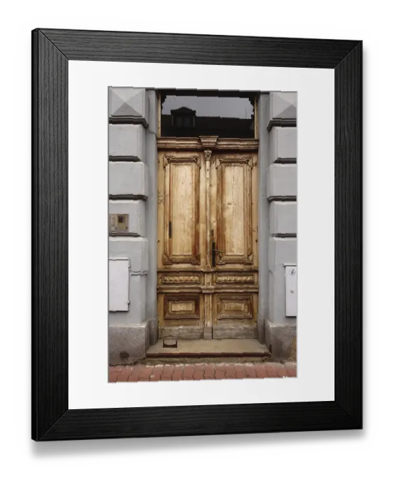 Framed Print : An aged wooden door with a rustic texture and historic architectural design