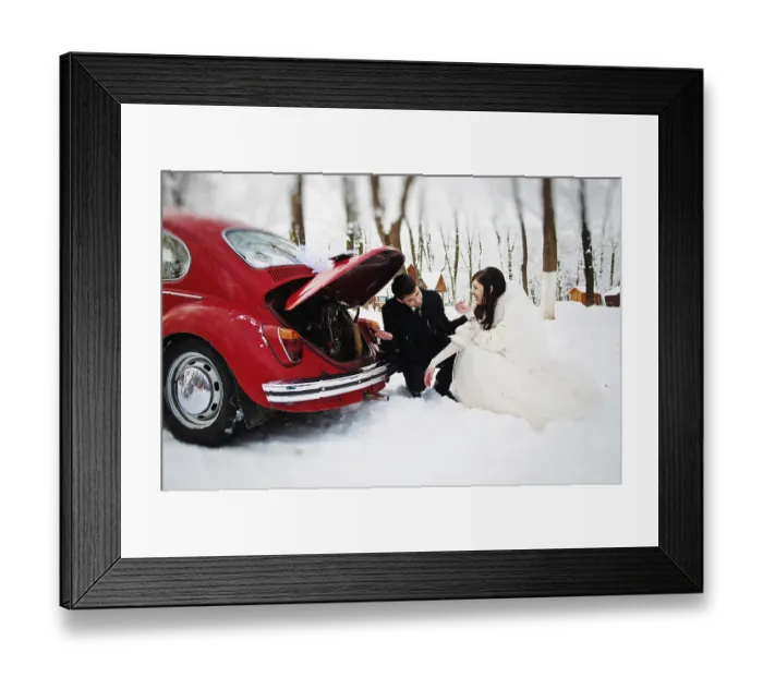 Framed Print : Wedding couple in winter near old vintage car
