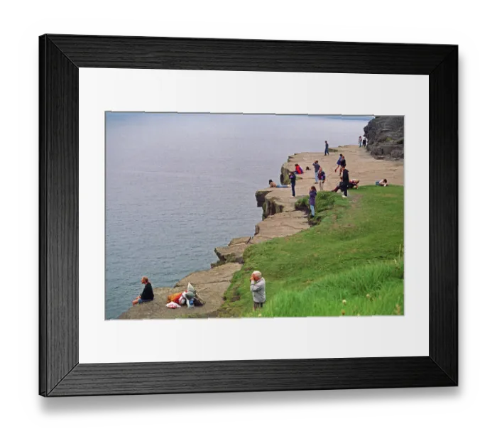 Framed Print : People on the cliff edge, there was no fence back then Framed Print : People on the cliff edge, there was no fence back then