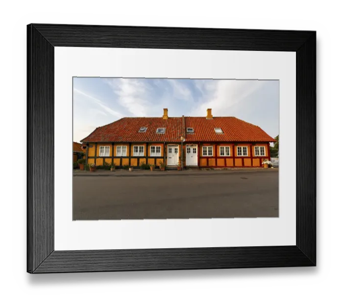 Framed Print : Typical colorful half-timbered house
