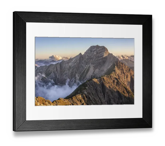 Framed Print : Mountain scenery with clouds and mist in the morning Framed Print : Mountain scenery with clouds and mist in the morning