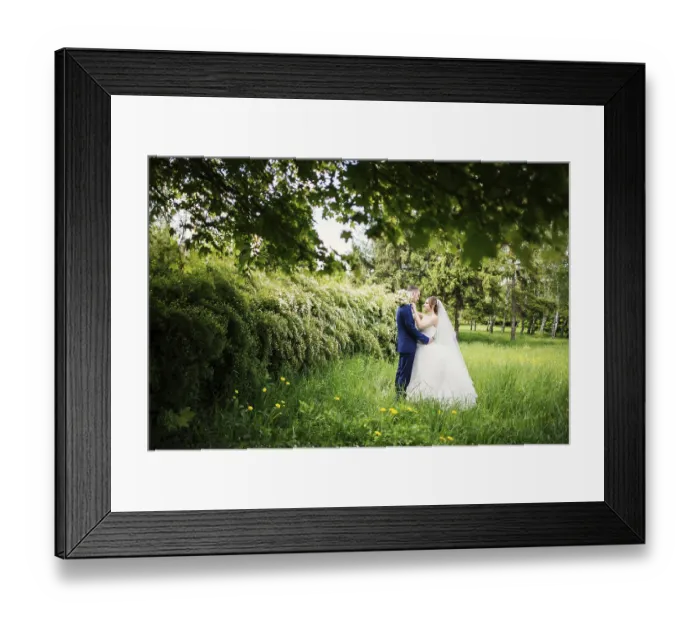 Framed Print : Young lovely and cheerfull wedding couple walking at the park
