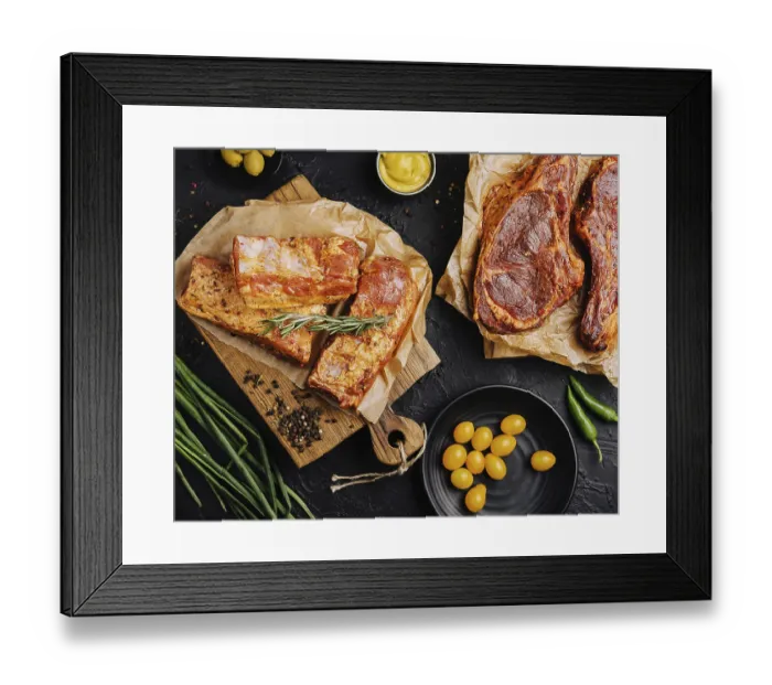 Framed Print : Food, Marinated pork steaks on cutting board and ingredients for cooking