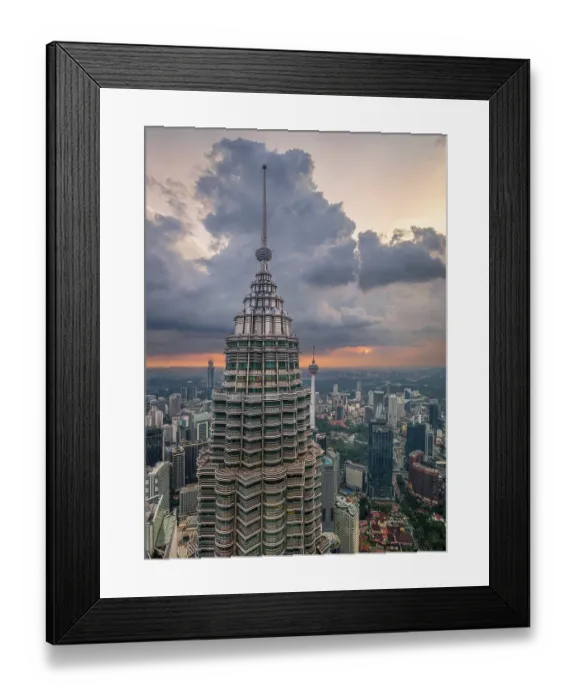 Framed Print : Nov 20, 2019 - Kuala Lumpur, Malaysia: Petronas Twin Tower and Menara KL tower at dramatic sunset sky