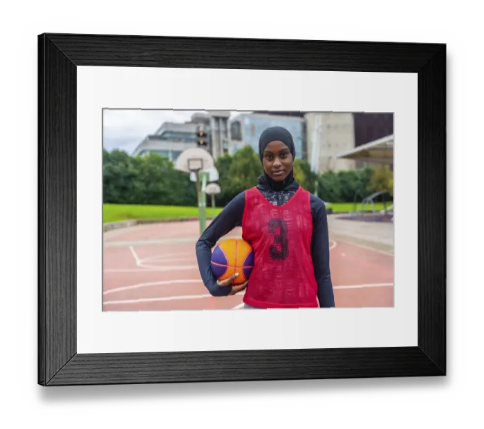 Framed Print : Young muslim woman wearing a hijab