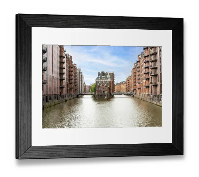 Framed Print : Iconic view of the historic Speicherstadt district and the Wasserschloss building in Hamburg