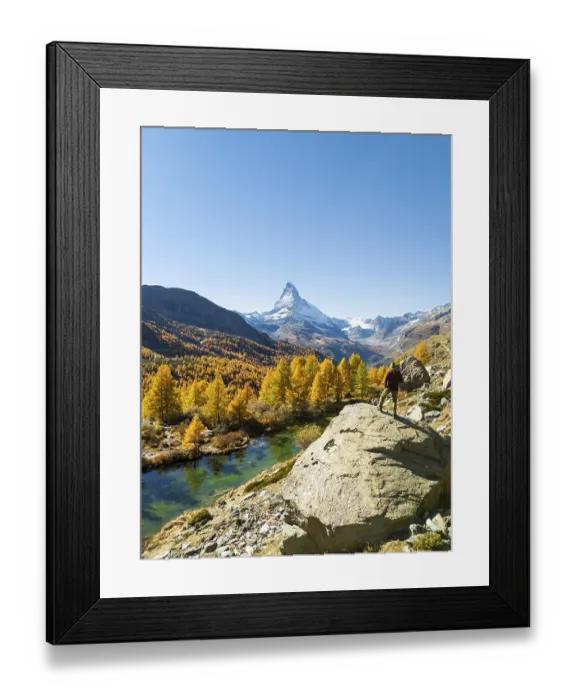 Framed Print : Hiker Man on Top of Boulder Looking at Matterhorn Mountain