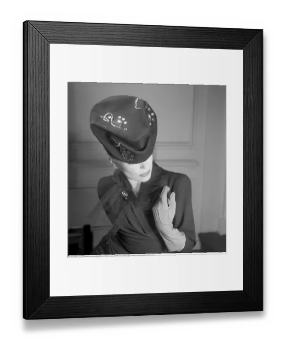 Framed Print : England 1945. A fashionable young woman wearing a creative hat and decoration Framed Print : England 1945. A fashionable young woman wearing a creative hat and decoration