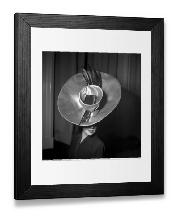 Framed Print : England 1945. A fashionable young woman wearing a creative hat and decoration Framed Print : England 1945. A fashionable young woman wearing a creative hat and decoration