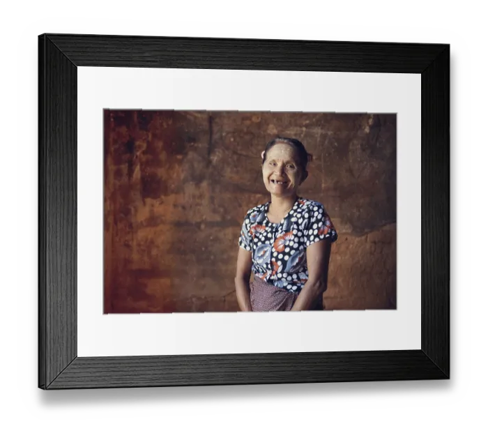 Framed Print : Portrait of traditional old Asian Burmese woman smiling