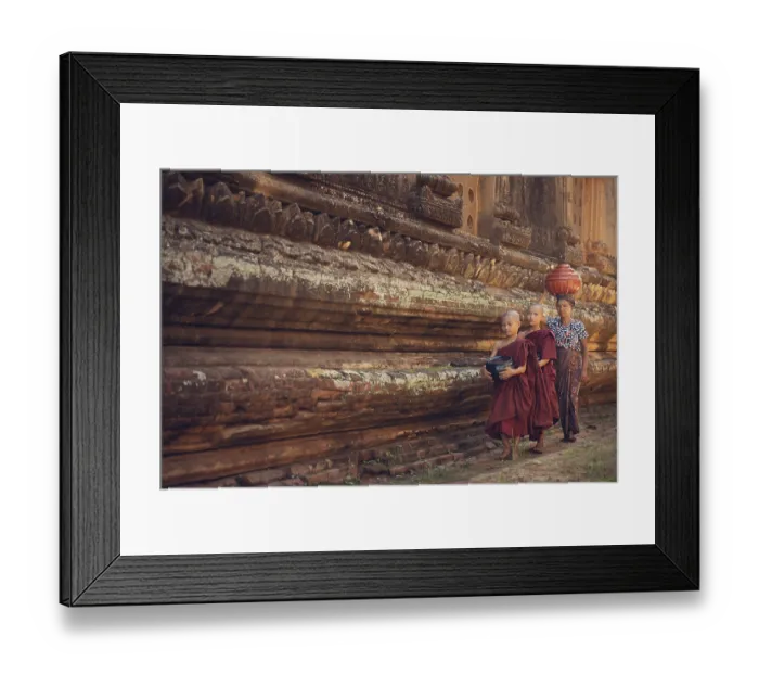 Framed Print : Young Buddhist novice monks walking morning alms in Old Bagan