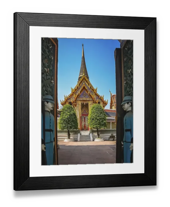Framed Print : Soldiers sculptures guarding open gates to the Buddhist temple in Bangkok