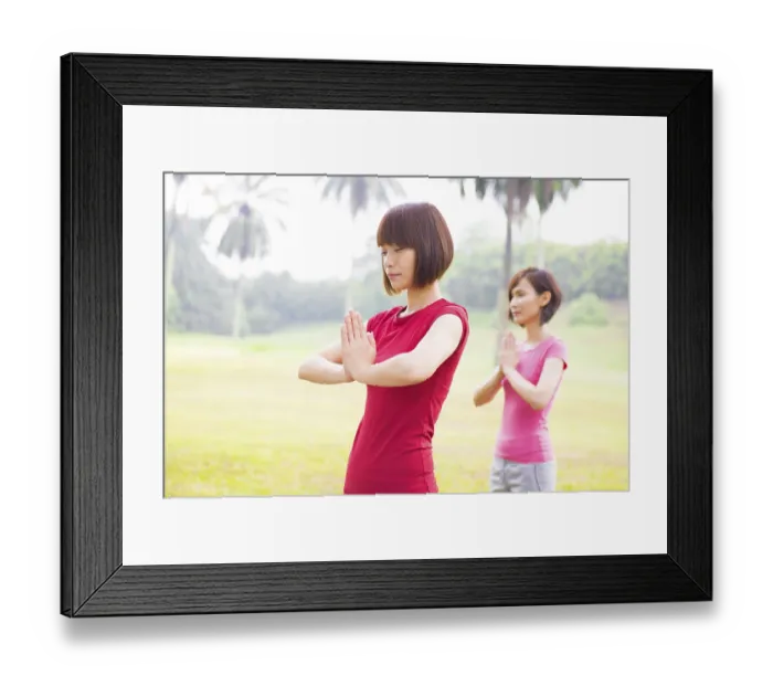 Framed Print : Asian girls performing yoga at outdoor park