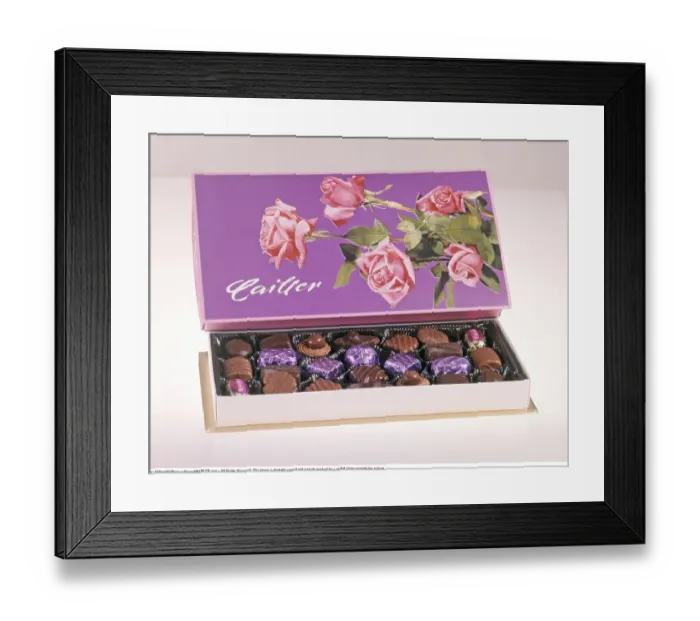 Framed Print : Boxes of chocolate 1960s. A box with assorted chocolates by the swiss chocolate maker Cailler