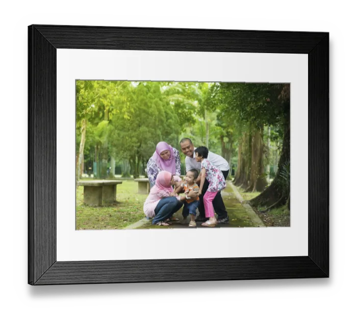 Framed Print : Family playing at outdoor garden park