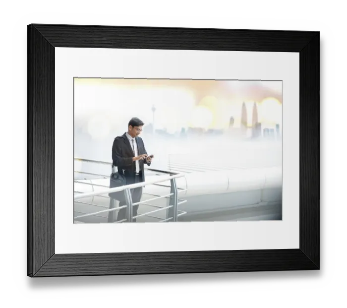 Framed Print : Asian businessman using smartphone Framed Print : Asian businessman using smartphone
