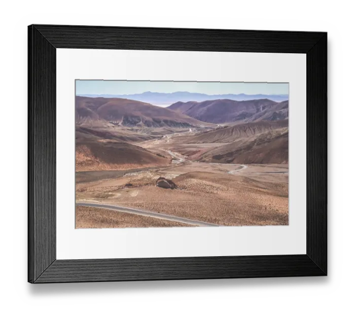 Framed Print : Twisting road from the high plateau to Quebrada de Humahuaca mountains in northern Argentina Framed Print : Twisting road from the high plateau to Quebrada de Humahuaca mountains in northern Argentina