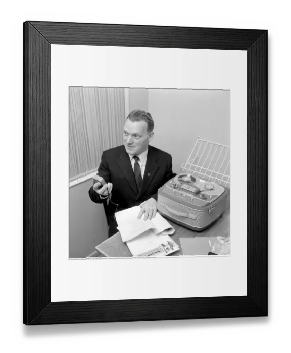 Framed Print : The Grundig Reel-to-Reel Recorder TK 25 A man with a microphone recording on his Grundig reel-to-reel tape recorder