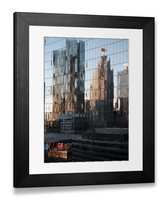 Framed Print : Distorted reflections of buildings on a glass facade in warm morning light in Toronto