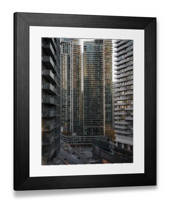 Framed Print : Cityscape with tall modern skyscrapers in the warm light of sunset in Toronto Framed Print : Cityscape with tall modern skyscrapers in the warm light of sunset in Toronto