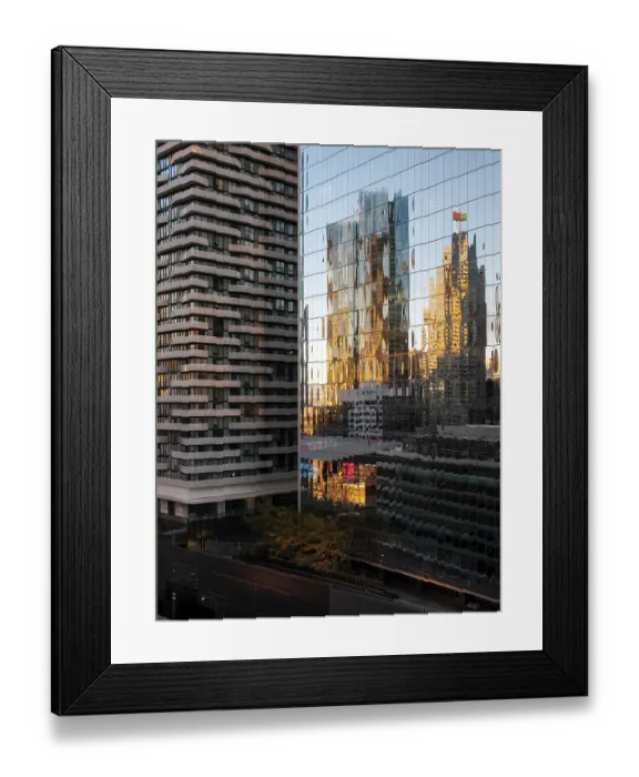 Framed Print : Buildings reflecting warm sunset hues on their glass surfaces in an urban setting in Toronto