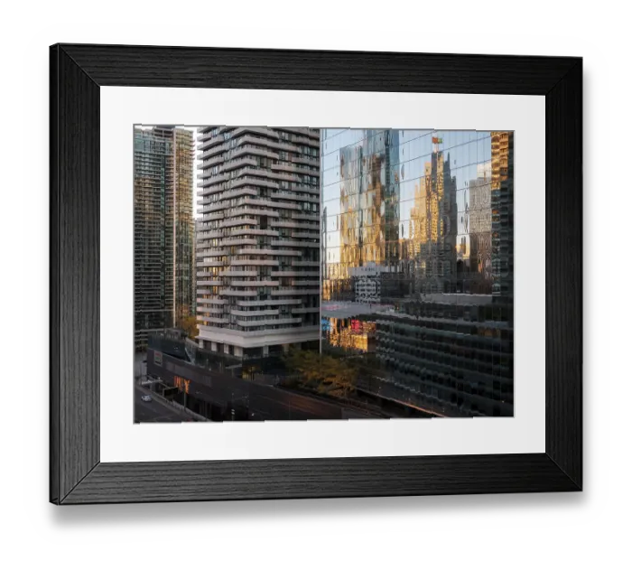Framed Print : Skyscrapers with glass facades reflecting sunset colors in a city environment in Toronto