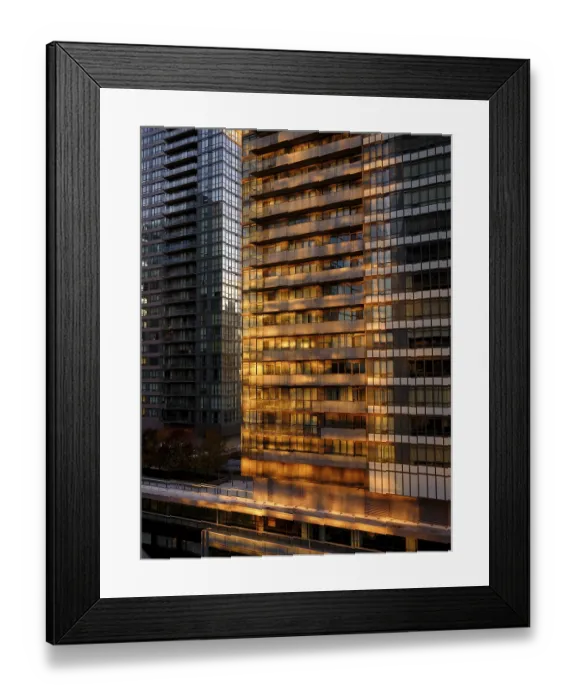 Framed Print : Sunset reflecting on skyscraper glass