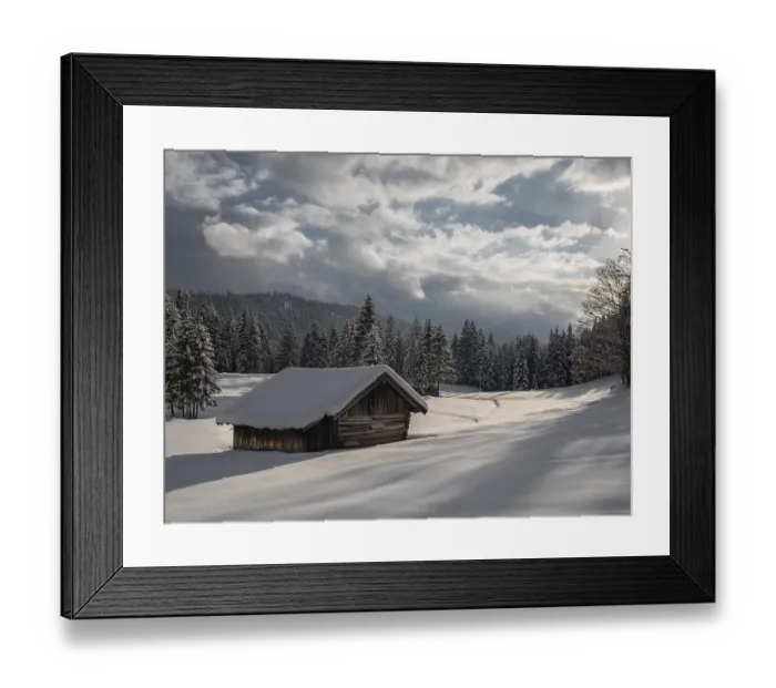 Framed Print : Snowy cabin in a wintry forest under a dramatic sky Framed Print : Snowy cabin in a wintry forest under a dramatic sky