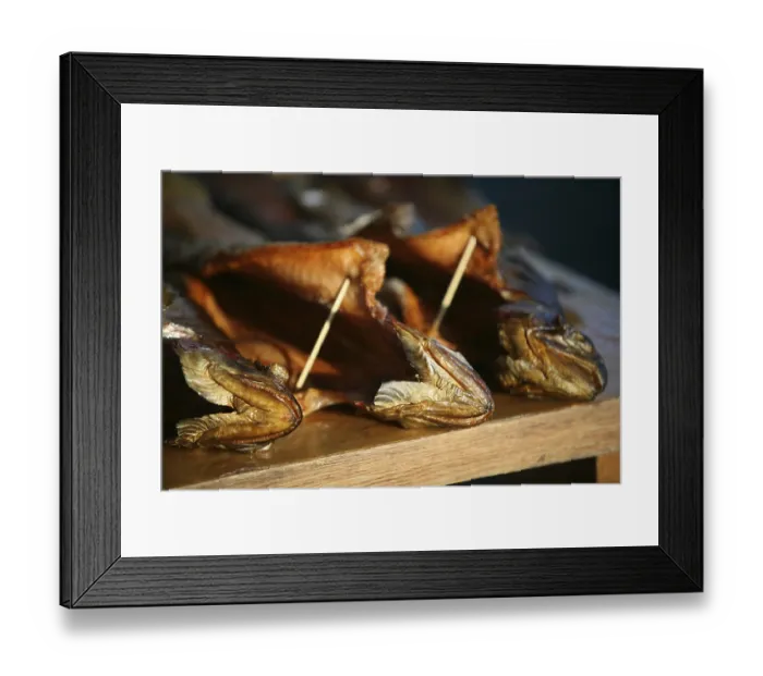 Framed Print : Smoked trout on a counter