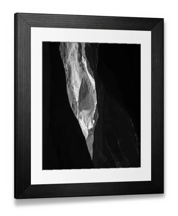 Framed Print : Dramatic narrow rock crevice with light shaft in Lauterbrunnen
