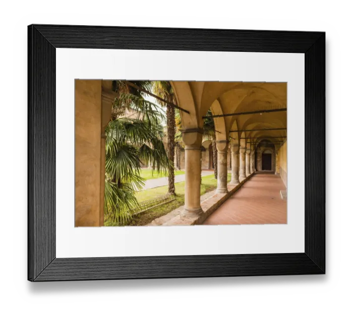 Framed Print : Colonnade and archs of cloister of the XV century roman gothic church dedicated to Saint Francis in Cotignola in Italy