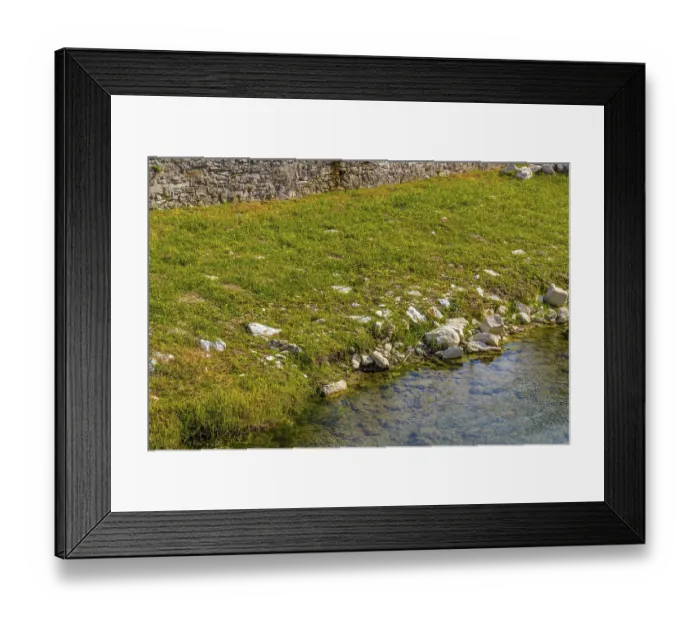 Framed Print : The waters of the stream Tramazzo while bathing the hill village of Tredozio in Romagna in the countryside in Northern