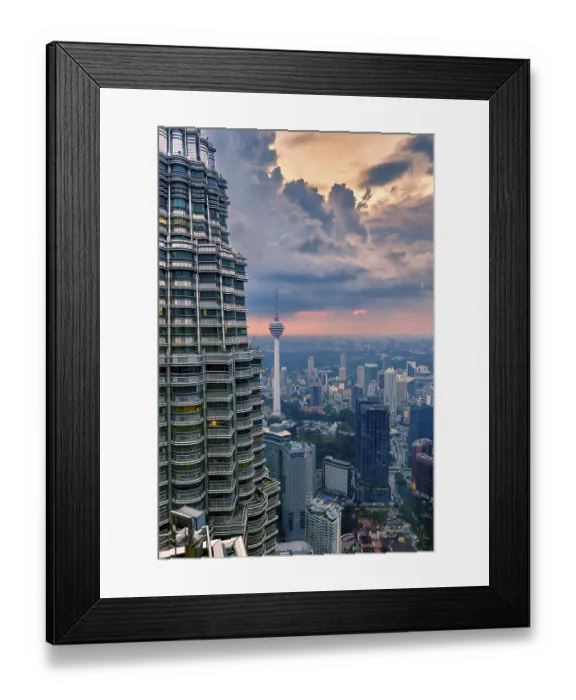 Framed Print : Nov 20, 2019 - Kuala Lumpur, Malaysia: Petronas Twin Tower and Menara KL tower at dramatic sunset sky