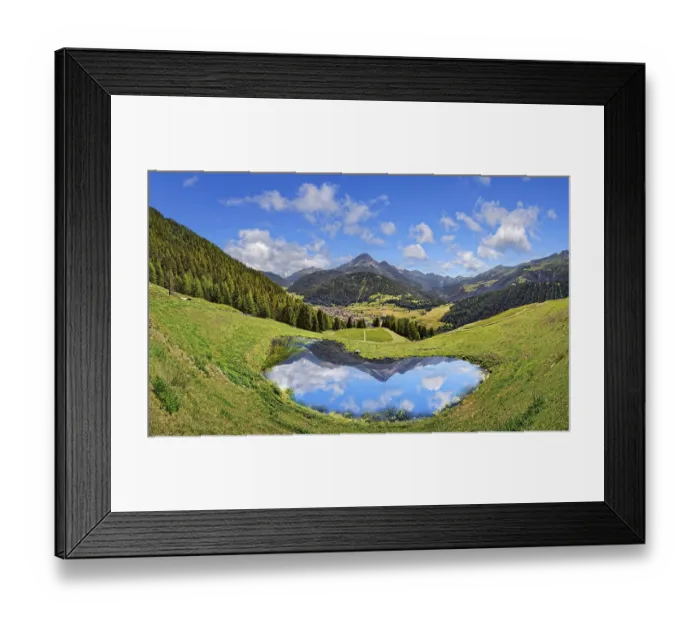 Framed Print : Alpine meadow with small lake and reflection