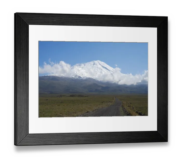 Framed Print : A snow-covered mountain under blue sky with a path in the foreground Framed Print : A snow-covered mountain under blue sky with a path in the foreground