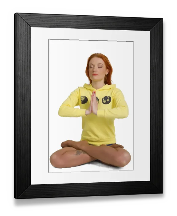 Framed Print : Young woman practicing yoga in the lotus position Isolated against white background Framed Print : Young woman practicing yoga in the lotus position Isolated against white background