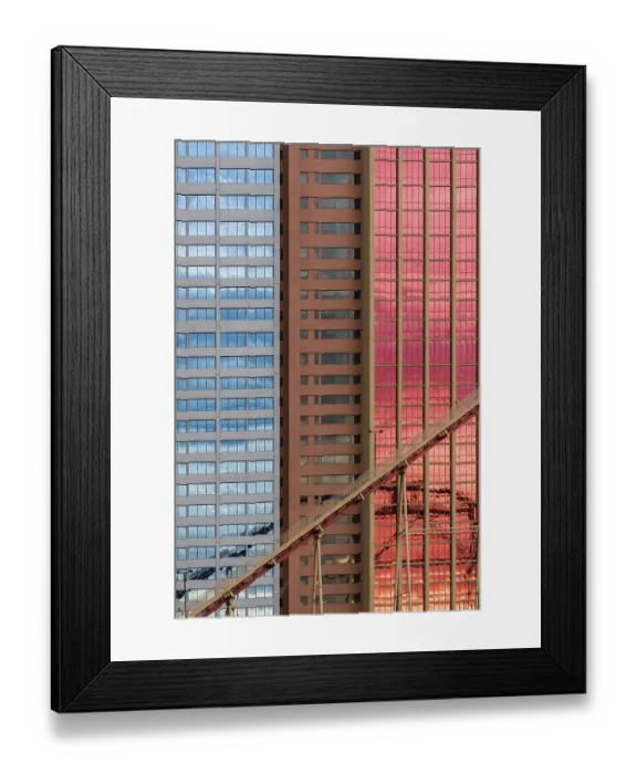 Framed Print : Geometrical patterns on building facade with sky and cloud reflections shot in Las Vegas Framed Print : Geometrical patterns on building facade with sky and cloud reflections shot in Las Vegas