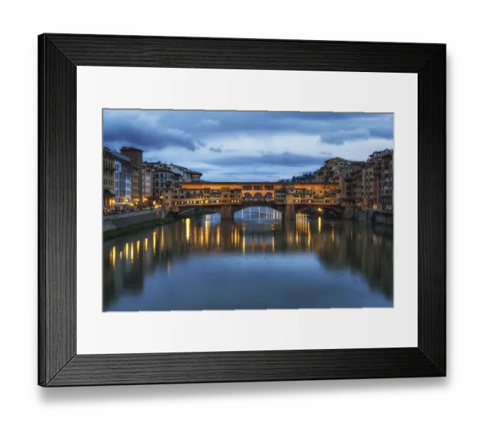 Framed Print : Ponte Vecchio and the buildings close by at night reflecting on the river Arno