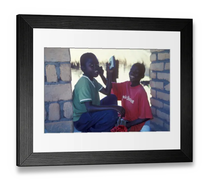 Framed Print : Two local boys with Walkman in a village near Kande Framed Print : Two local boys with Walkman in a village near Kande