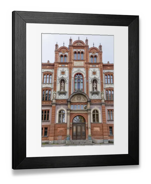 Framed Print : Elaborate red and white main building with sculptures and semicircular windows Framed Print : Elaborate red and white main building with sculptures and semicircular windows