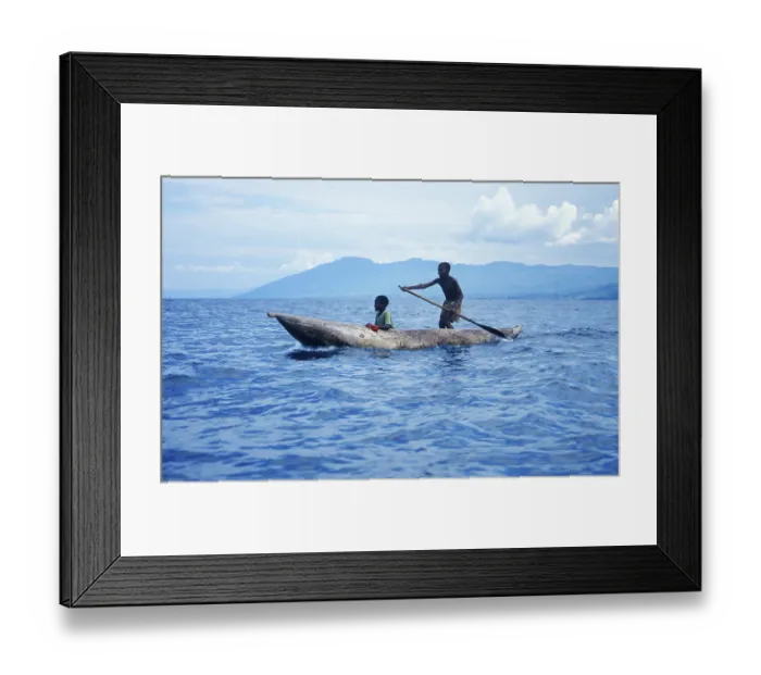 Framed Print : Two boys in a dugout on Lake Malawi